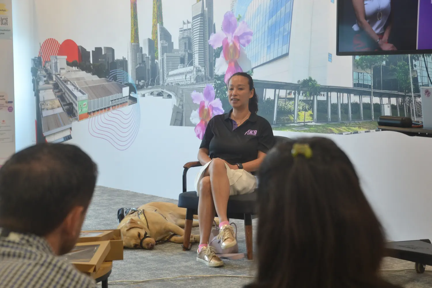 K9 Assistance Executive Director speaking at an Assistance Dog awareness event