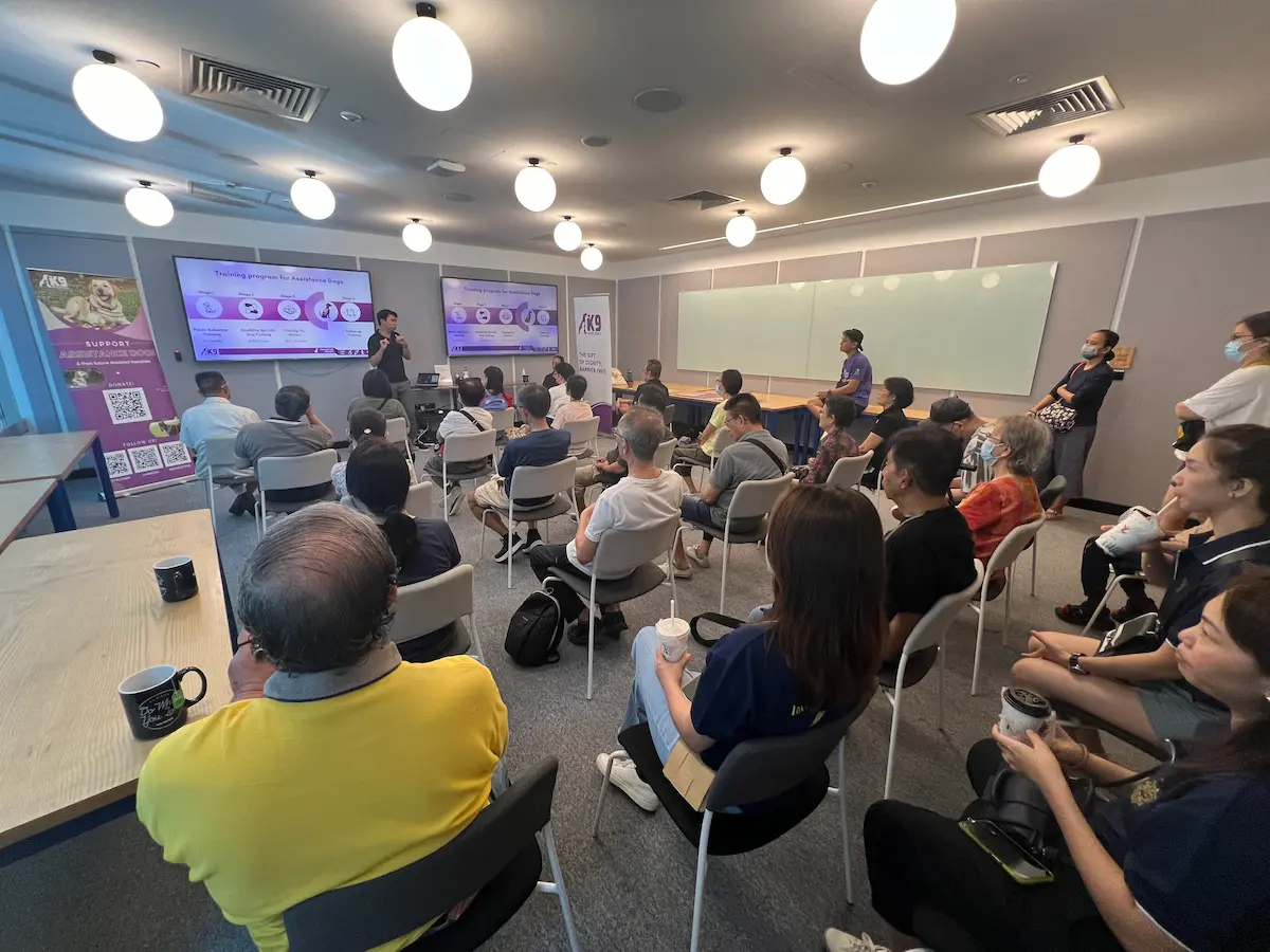 Juliano speaking at an Assistance Dog awareness event