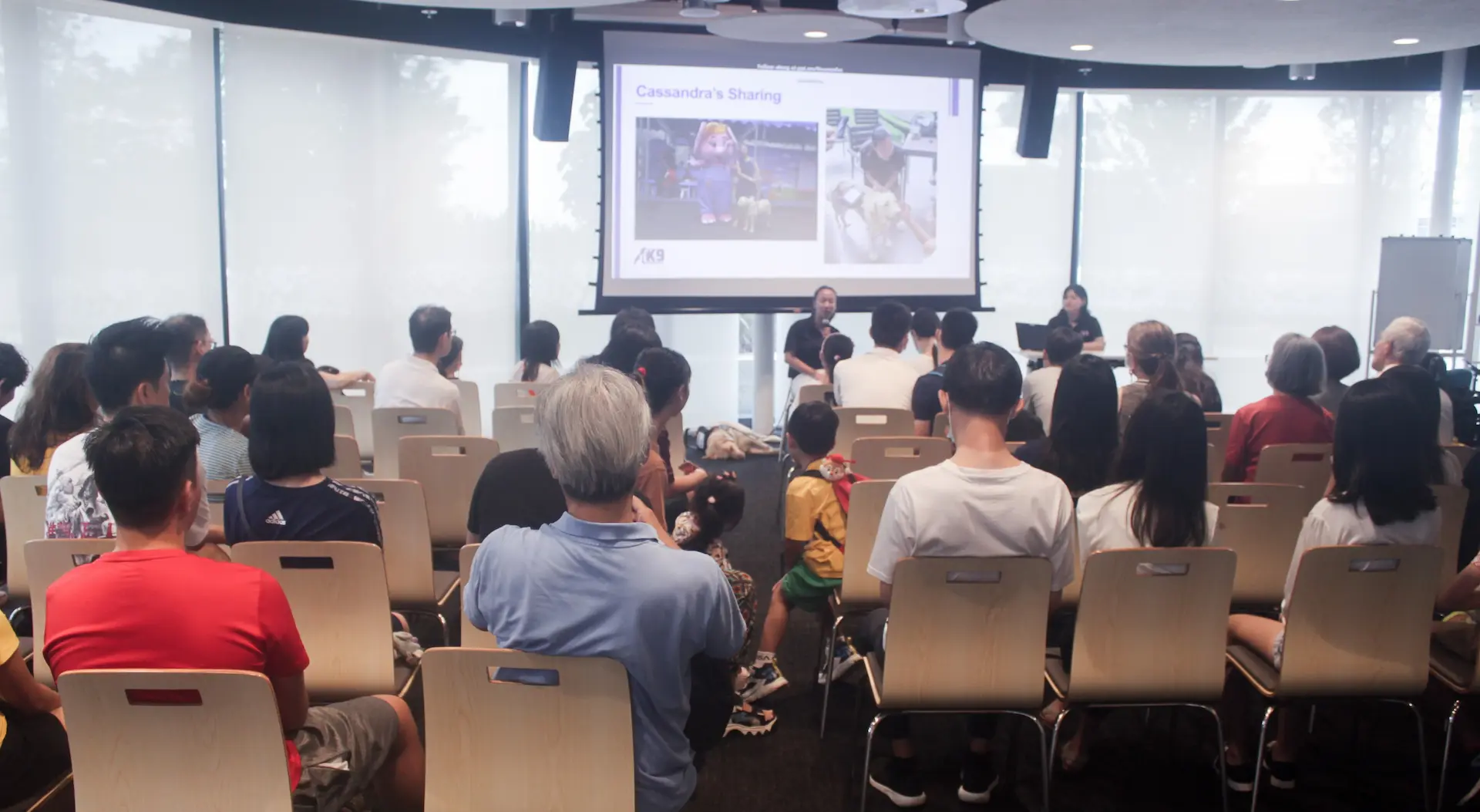 K9 Assistance Executive Director speaking at an Assistance Dog awareness event