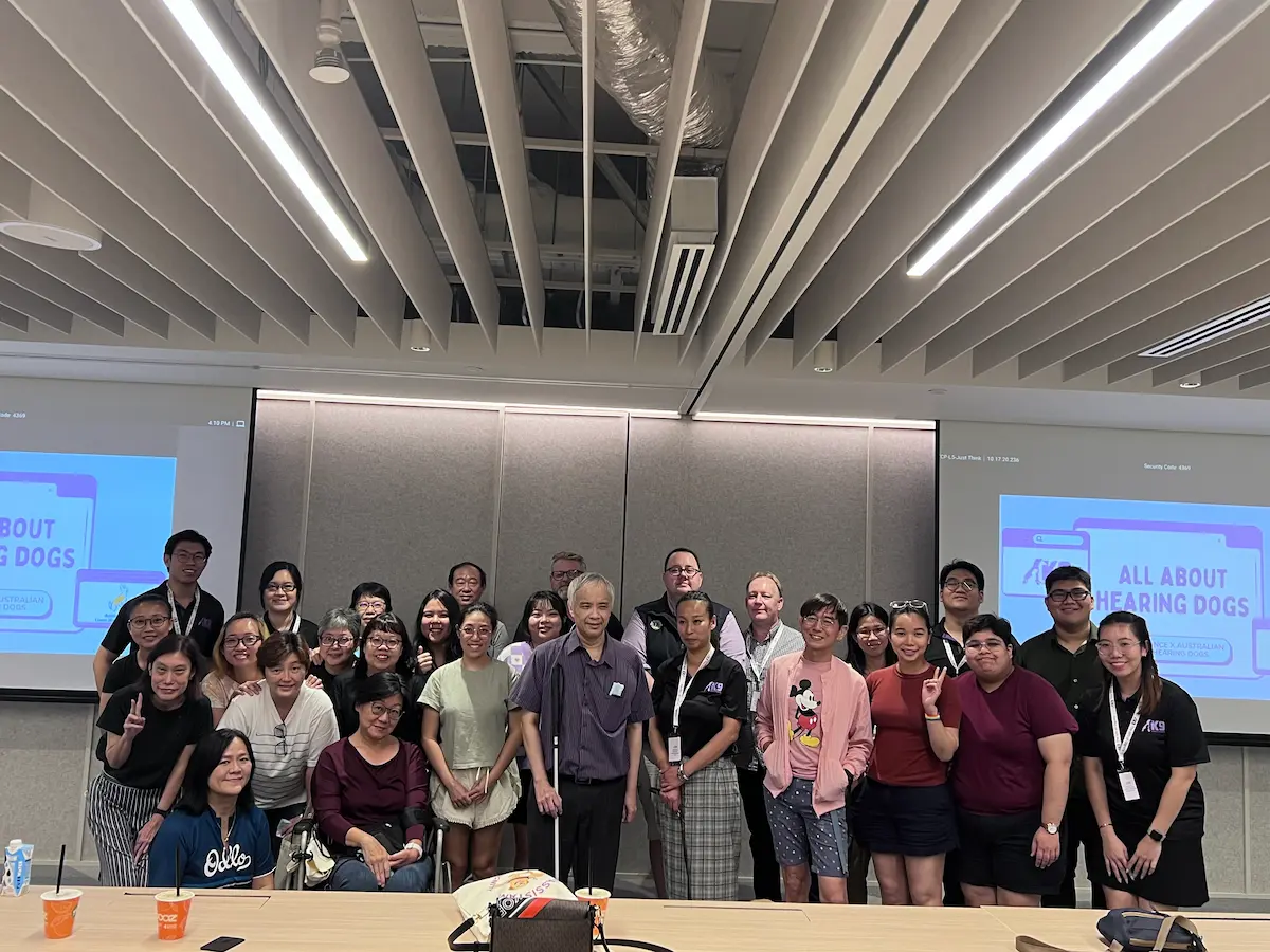 Group photograph of attendees at an Assistance Dog awareness event