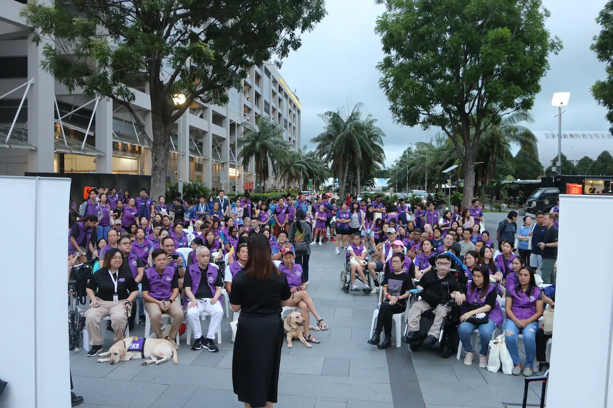 Photo of a group of seated audience members, taken at K9 Empawer Walk 2024.